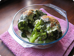 Cooked brocoli in a transparent bowl